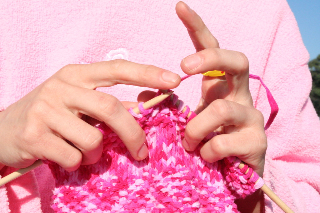 Pink_knitting_in_front_of_pink_sweatshirt